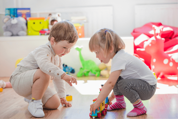 Children playing together in a nursery